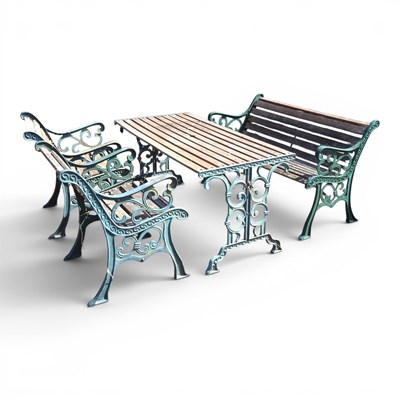 Lot 189 - A green painted cast iron garden table, with a...