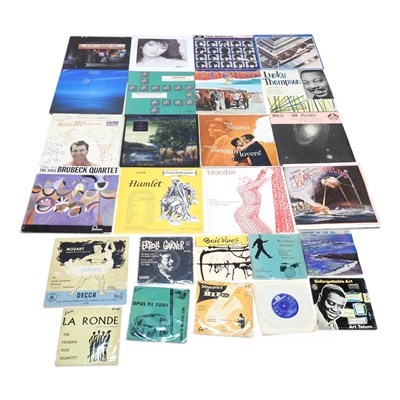 Lot 551 - A collection of vinyl records and singles