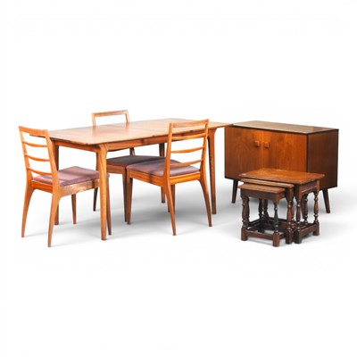 Lot 634 - A 1970s teak dining table, of rectangular...