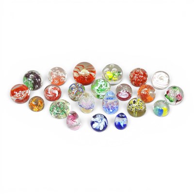 Lot 198 - A collection of glass paperweights, together...