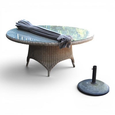 Lot 567 - A circular glass top rattan garden table,...