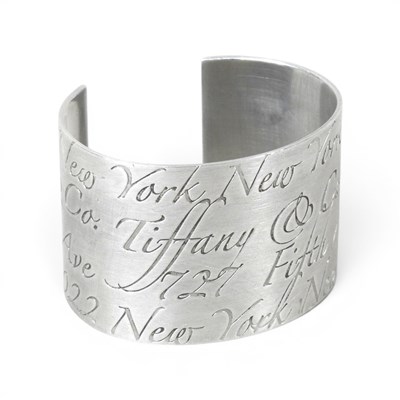 Lot 167 - A sterling silver Tiffany cuff bangle,...