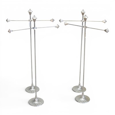 Lot 212 - A collection of four metal jewellery stands,...