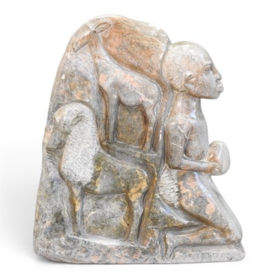 Lot 49 - An African soapstone carving, of a kneeling...