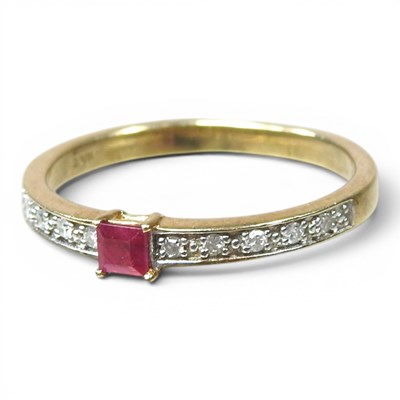 Lot 265 - A 10 carat gold ruby and diamond half hoop...