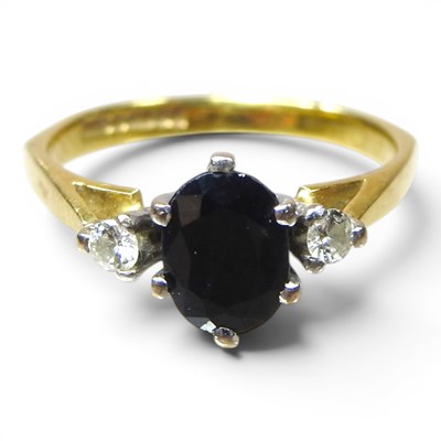 Lot 260 - A large 18 carat gold sapphire and diamond...
