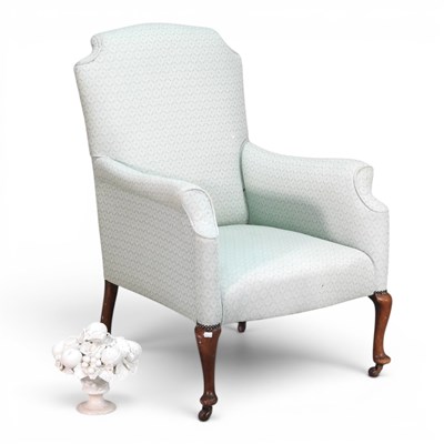 Lot 228 - An early 20th century green upholstered wing...