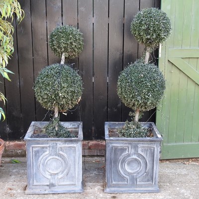 Lot 250 - A pair of composition garden pots, 49cm wide,...