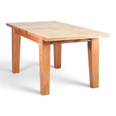 Lot 463 - A modern light oak extending dining table, on...