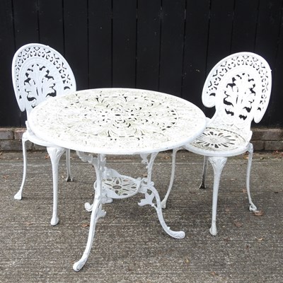 Lot 257 - A white painted metal garden table, 82cm in...
