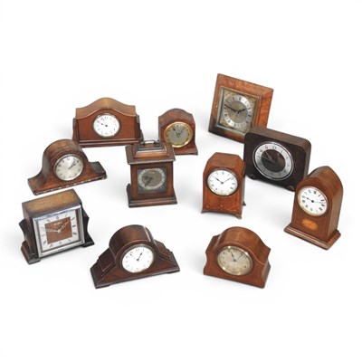 Lot 553 - An Edwardian inlaid mantel clock, of lancet...