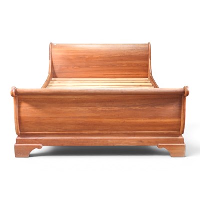 Lot 134 - A modern cherrywood double sleigh bed, with a...