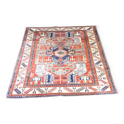 Lot 500 - A Shirvan rug, with geometric designs, on a...